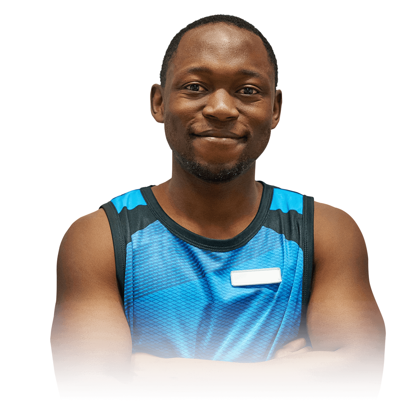 A man standing with folded hands.